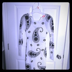 NWOT  Sheer white dress with black detail design.
